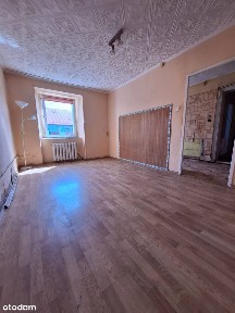 Kawalerka z garażem i ogródkiem - idealna do własnej aranżacji !