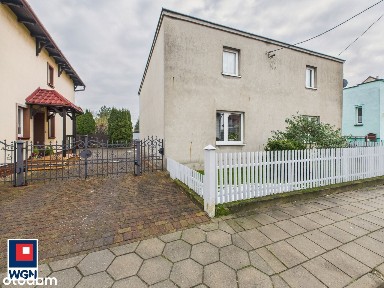 Atrakcyjny dom w spokojnej dzielnicy miasta z dużą działką w Kościanie