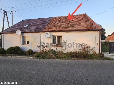 Dom w zabudowie bliźniaczej z garażem