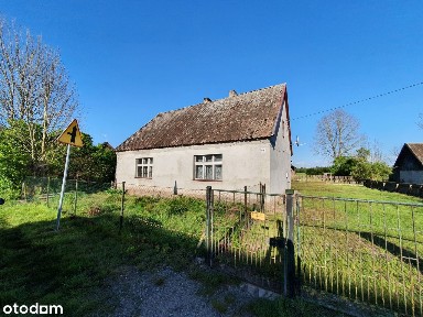 Dom z budynkiem gospodarczym i działką