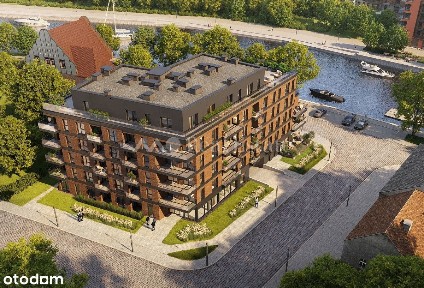 Kameralna kawalerka nad Motławą