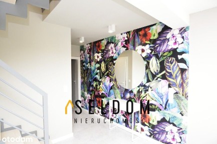 Komfortowa połówka bliźniaka z ogrodem