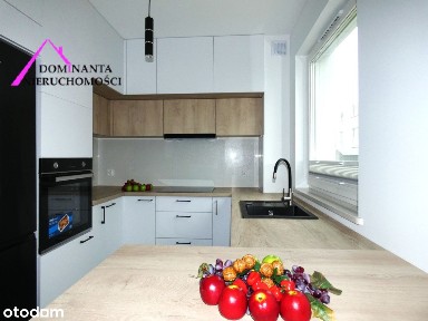 Dom w zabudowie bliźniaczej z ogródkiem w Pogórzu.