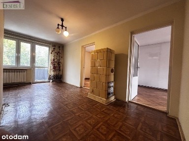 Trzy pokoje z dwoma balkonami