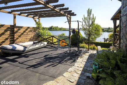 Dom nad jeziorem w Spalona z unikalnym klimatem wiejskiej chaty