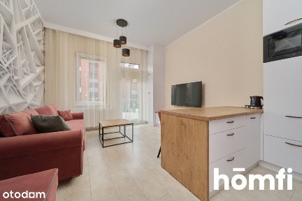 Mieszkanie z ogrodem/ Brzoskwiniowa