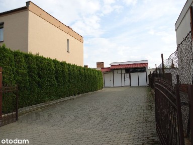 Sprzedam pod inwestycje dom z budynkiem użytkowym w Luboniu
