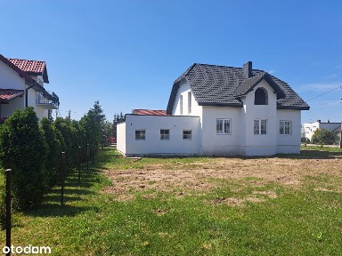 Przestronny dom z użytkowym poddaszem i 2 garażami Rogowo