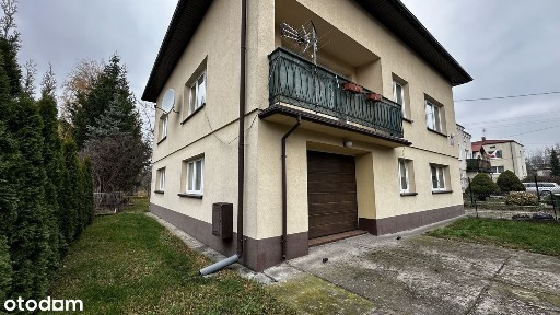 Dom jednorodzinny z garażem i ogrodem