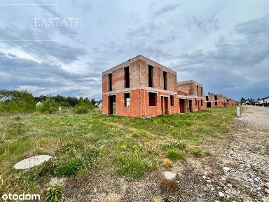 Bliźniaki w stanie surowym otwartym/działka 500 m2