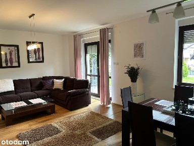 Przestronny apartament z kominkiem, tarasem i miejscem garażowym