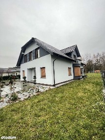 Nowoczesny dom z garażem i dużym ogrodem w mieście zamiana