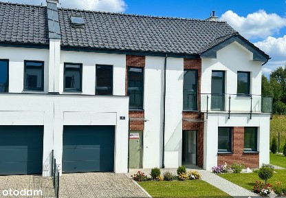 Nowoczesny, piękny segment z garażem i ogrodem w zabudowie bliźniaczej