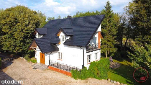 Dom z Ogrodem nad Jeziorem - Komfort i Spokój w Dź