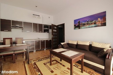 Kawalerka z ogródkiem na nowym osiedlu.