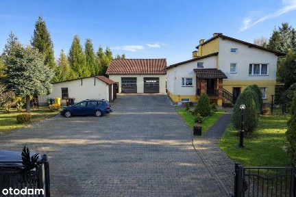 Przestronny dom z zabudową usługową