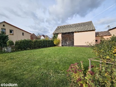 Dom z zabudowaniami gospodarczymi