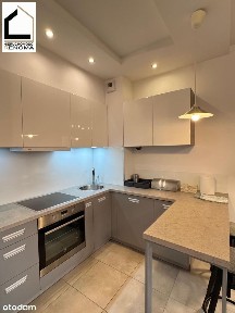 Nowoczesna kawalerka. Śródka - ul. Wiejska. Parking. Balkon. Winda.