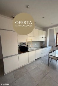 Słoneczne dwupoziomowe mieszkanie z balkonem