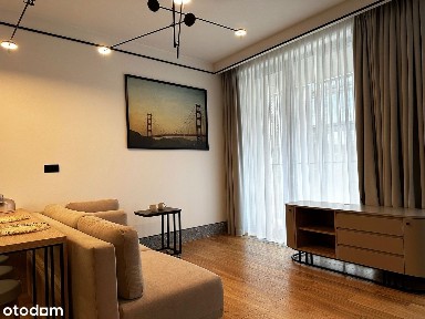 Funkcjonalna kawalerka z częścią sypialnianą (Moderna Powiśle, 37,6m2)