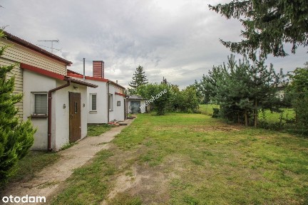 Spokojna lokalizacja, duża działka - dom 120 m² z garażami w Tuszynie