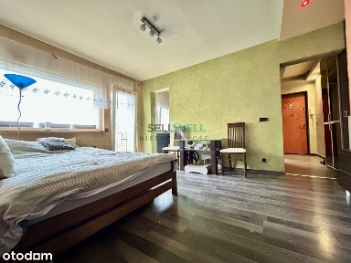 2 pokoje, balkon, ogrodzony teren.