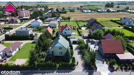 Solidny dom na zadbanej działce blisko jeziora