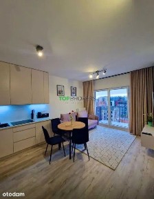 Piękny salon z aneksem i sypialnia, klima