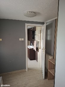 Przestronne 3-pokojowe mieszkanie z garażem i działką.