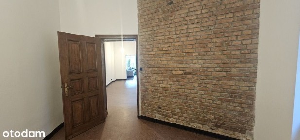 Lokal na parterze- Al. Piastów