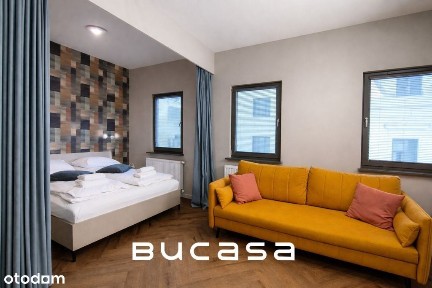 Apartament w centrum z dostępem do siłowni i spa