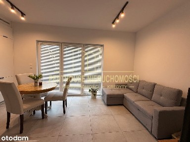 umeblowany apartament z tarasem i parkingiem