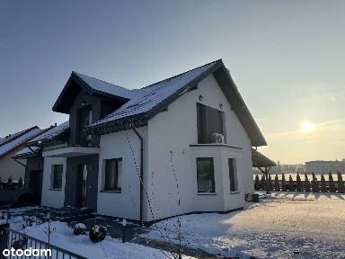 Nowoczesny dom z garażem w spokojnej okolicy