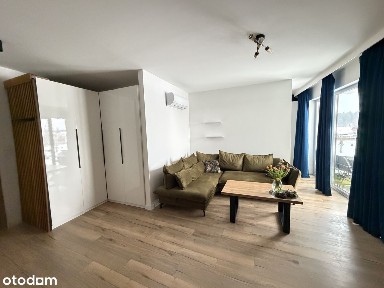 Nowoczesne mieszkanie z balkonem i garażem