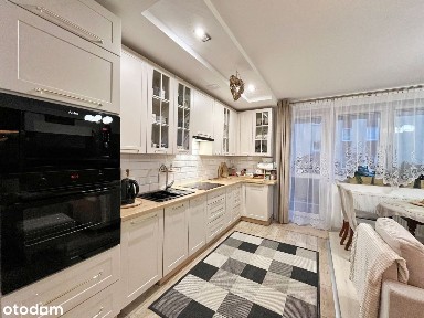 Mieszkanie z balkonem, ogródkiem i parkingiem