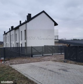 dom z garażem i wysokim poddaszem