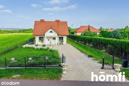 Dom na ogrodzonej widokowej 15arowej działce