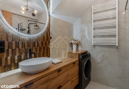 Dwupoziomowe mieszkanie z miejscami postojowymi