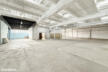 Magazyn biurem, dwie bramy z rampy, parking.