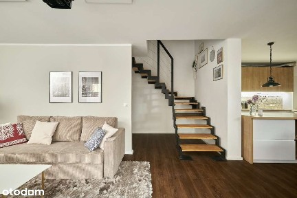 Dwupoziomowe mieszkanie z ogródkiem