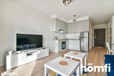 Nowoczesne wygodne mieszkanie z halą garażową