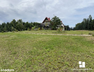 2 domy, linia brzegowa jeziora. MPZP mieszkaniowo