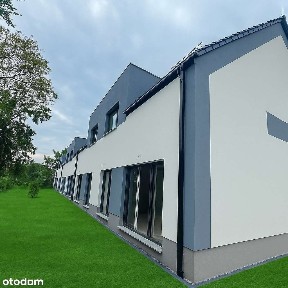 Nowoczesny dom w IWINACH z pompą ciepła i fotowoltaiką, zab. szeregowa