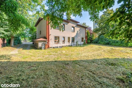 Budynek użytkowy z cz. mieszkalną i parkingiem