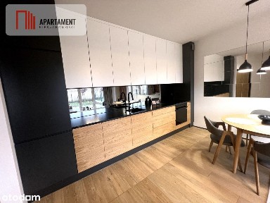 Apartament o wysokim standardzie z ogródkiem.