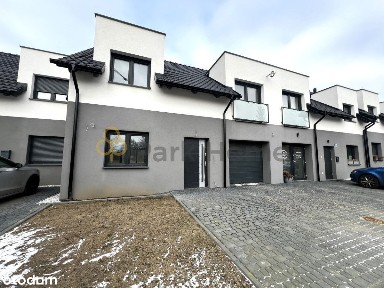 Dwupoziomowy lokal mieszkalny z ogródkiem. Garaż.