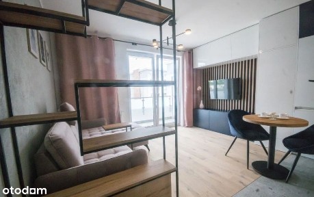 Nowoczesna kawalerka z balkonem w Katowicach i miejsce postojowym