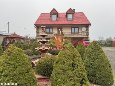 Samowystarczalny dom z ogrodem i stawem