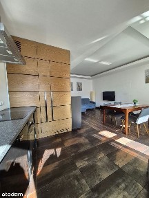 Apartament z balkonem, widok na patio, garaż podziemny, komórka lok.