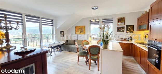 Atrkacyjny apartament z dużym balkonem